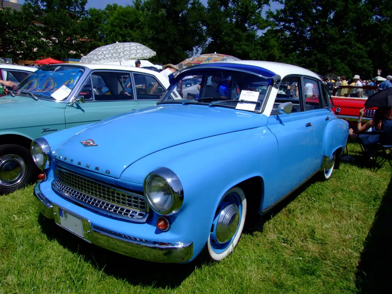 A light blue Wartburg 311 saloon from 1959 on a show field